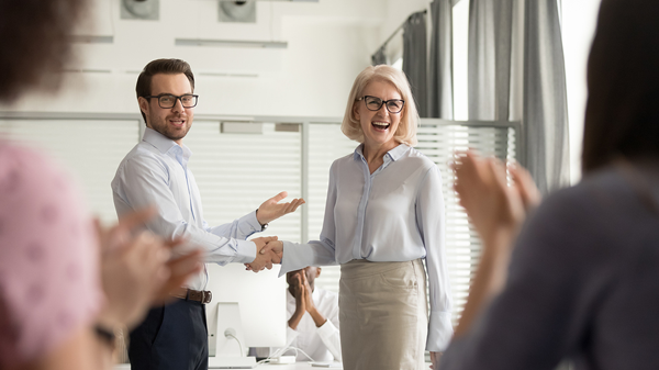 staff member shaking hands in appreciation