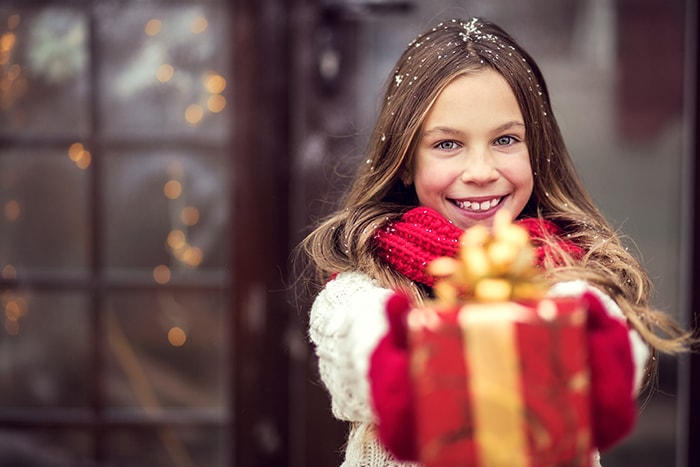 girl giving a gift