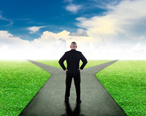 Man standing at crossroads, image for copywriting that takes you to destination