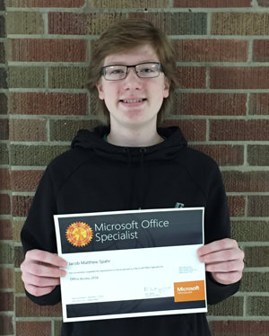 Jacob holding a certificate