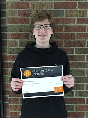Jacob Spahr holding his certificate