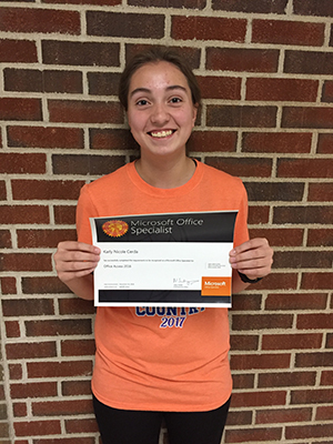 Karly Cerda holding her certificate