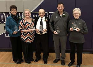 2018-2019 North Cedar Alumni Award recipients holding their awards