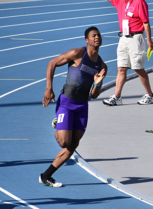 Greg Hansen running the 200 meter dash