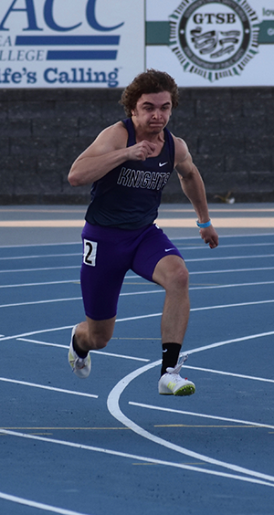 Miles McCollough running in the 100 meter dash