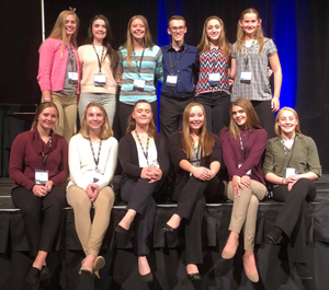 Group of twelve smiling FBLA members