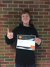 Jacob Spahr holding his certificate for the Microsoft Office 2016 Excel Specialist Exam
