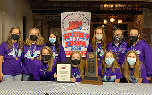 North Cedar Cheer team with state champion two trophies
