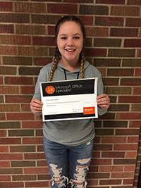 Tatum Slaton poses with her certificate