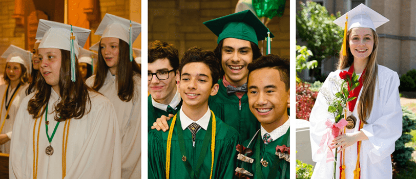 New alumni pose together wearing their graduation attire