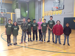 Students wearing their 100 mile club t-shirts