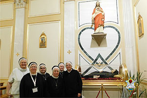 Sisters visiting Blessed Clelia's tomb