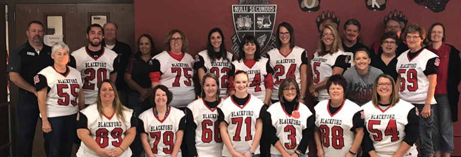 Staff members pose together