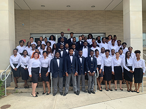 East Orange Campus Chamber Singers pose together outside