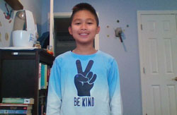 Student wearing Be Kind tee shirt