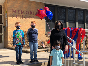 Principal Laverne O’Boyle with two kindergarten friends from Mrs. Baker's class and a second-grader from Ms. Scimeca’s class