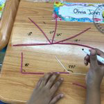 Student practices making and measuring angles using Bendaroos and markers