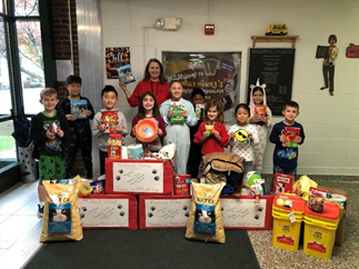 students with donations for the animal shelter