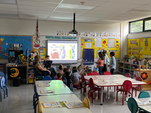 students mentoring other students in the classroom