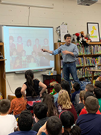 Christopher Weyant discusses his writing process using pictures in a presentation