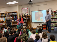 Anna Kang and Christopher Weyant discuss their writing process using pictures in a presentation