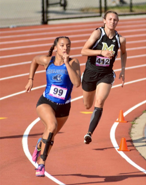 Madison-Grant junior Emma Ewer runs through the turn