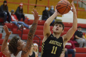 Madison-Grant player making a shot