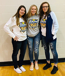 Molly Comfort, Mariah Buxton and Elizabeth Morris pose together
