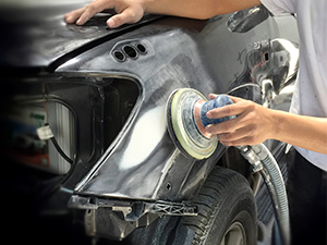 Student working on automobile repair