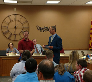Mark Goodman receiving appreciation from board
