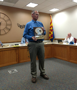 Mr. Solomon displaying sportsmanship award