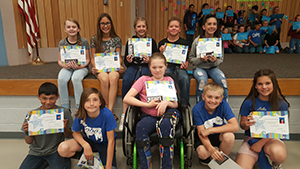 Million Word Readers pose with their certificates