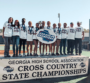 2019 GHSA 7A girls cross country state champions pose together