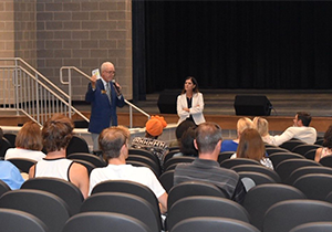 Cobb Juvenile Court Judge Jeff Hamby discusses the dangers of vaping during his presentation in an auditorium