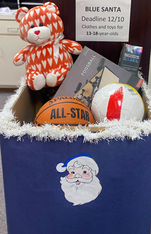 Toys in Blue Santa donation box