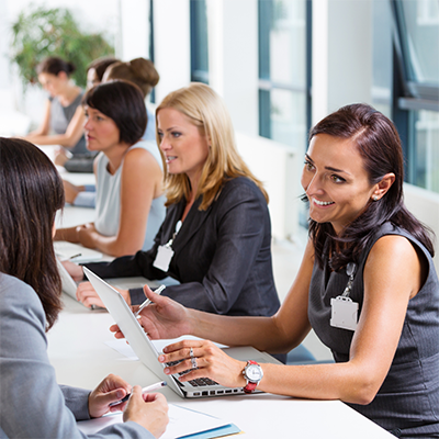 HR team interviewing candidates at a job fair