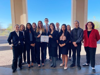 group of students at flba competition holding certificate