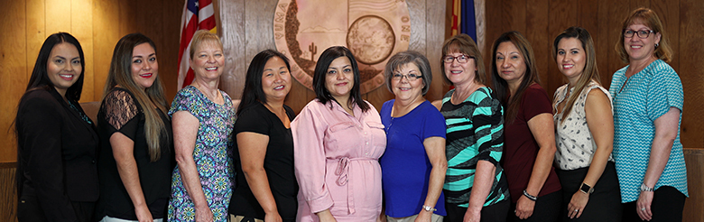 Finance staff members pose together
