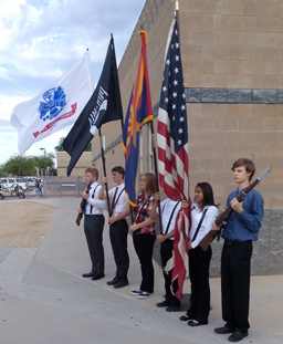 JROTC Color Guard members hold flags