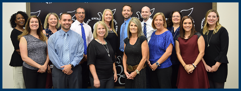 Staff members posing together