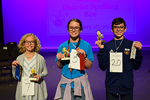 Top three student winners in the spelling bee